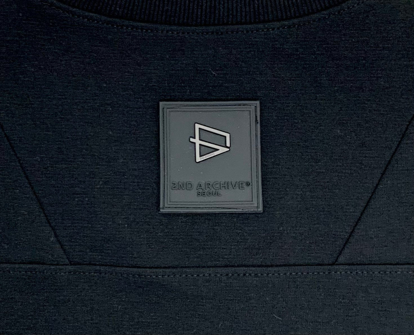 Close up of brand logo on t-shirt. 