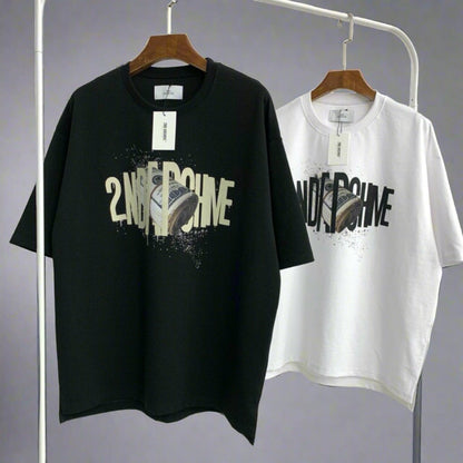 Black and white Korean street fashion t-shirts hanging on rack. 