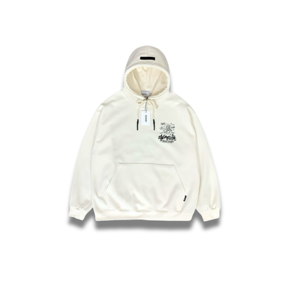 クリーム色パーカーの胸元に描かれたかわいいコーギーグラフィックのアップ