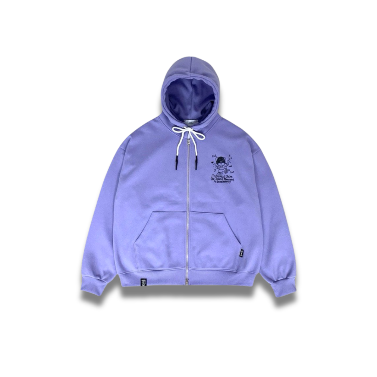 クリーム色のパーカーにプリントされたニットキャップベアのディテールアップ