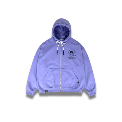 クリーム色のパーカーにプリントされたニットキャップベアのディテールアップ