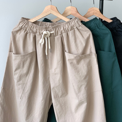 Korean made, beige balloon pants with adjustable waistband.