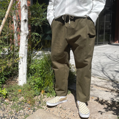 Khaki Korean slacks, street vibe.