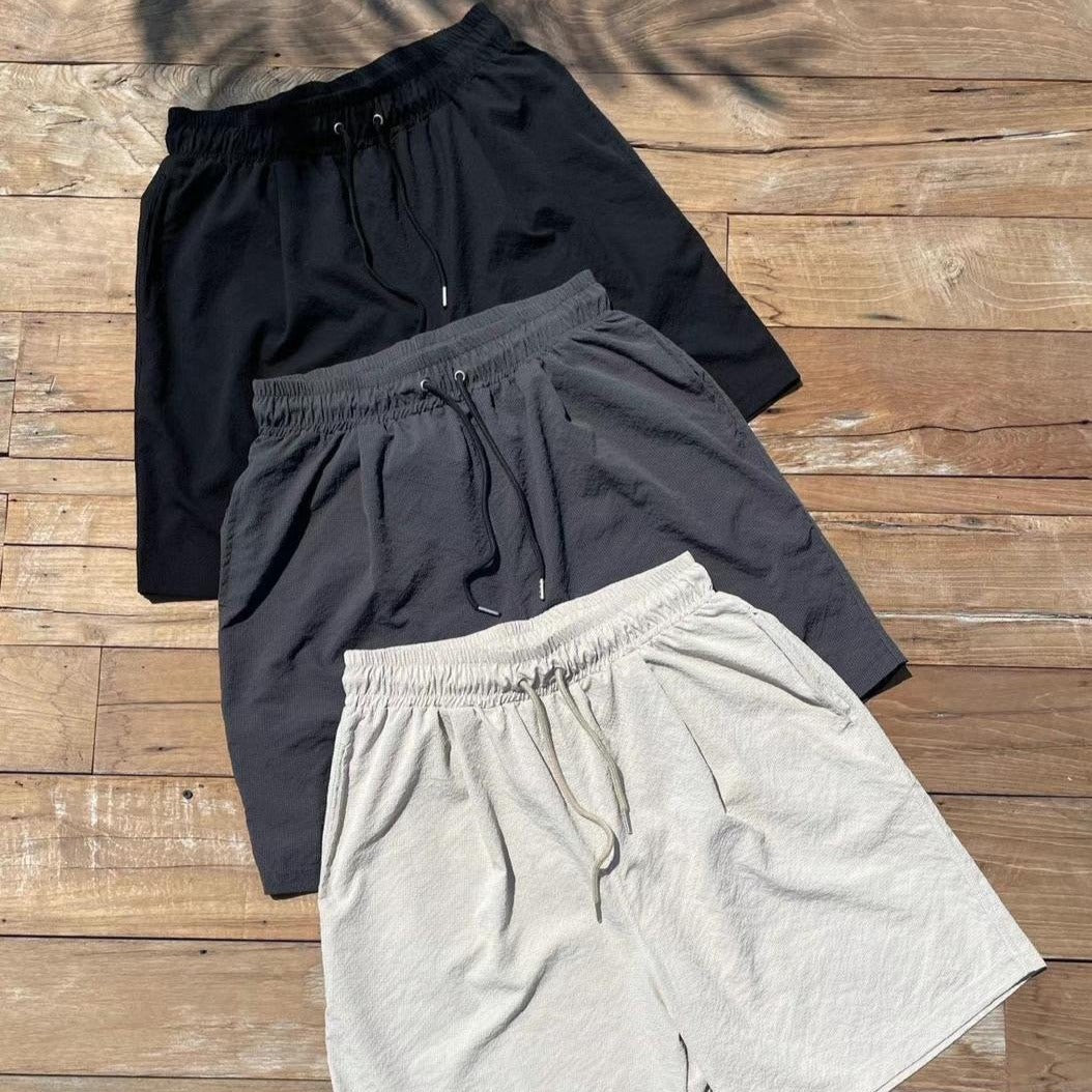 Black, gray and beige shorts ready for summer. 