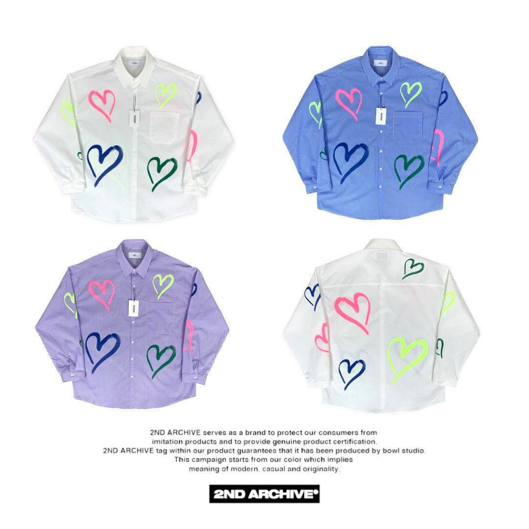 White, blue and purple button up shirts with cool heart graphics printed 