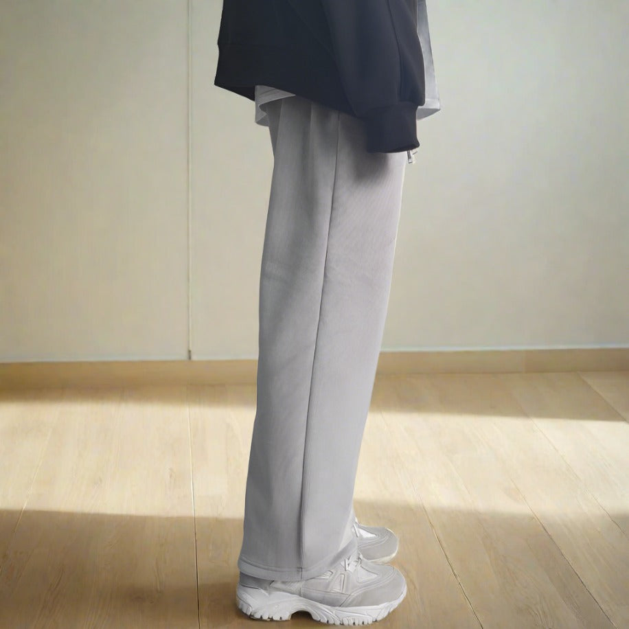 Side view of pants with a straight leg design. 