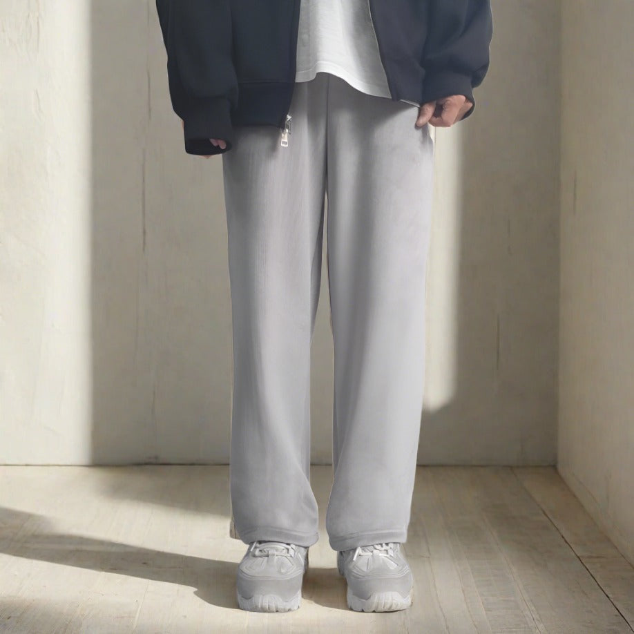 Fashionable gray pants with inner lining worn by a model. 