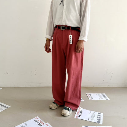 Salmon-colored Korean street slacks, oversized.