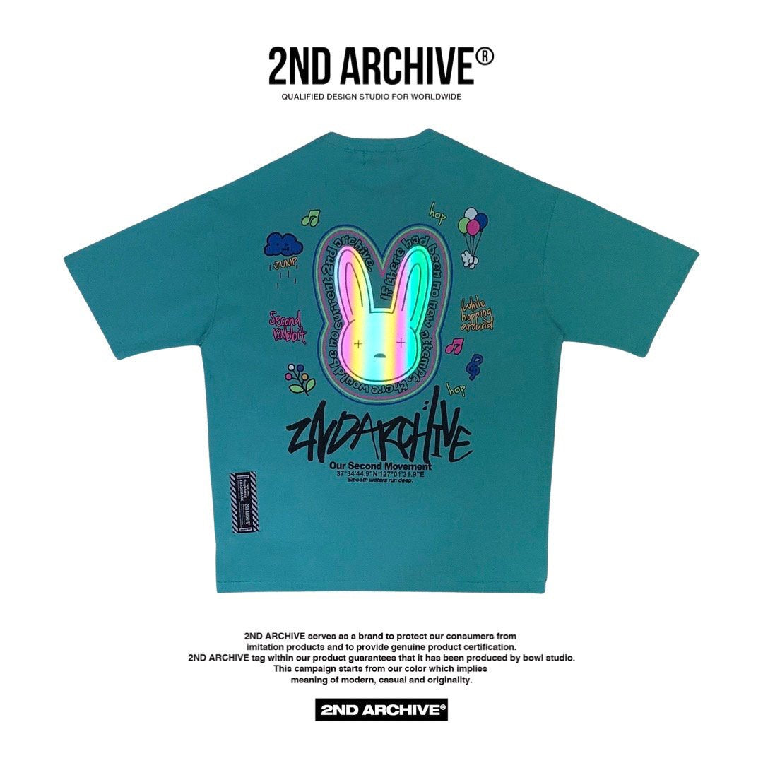 Light blue graphic t shirt with cool glow in the dark bunny graphic made in Korea. 