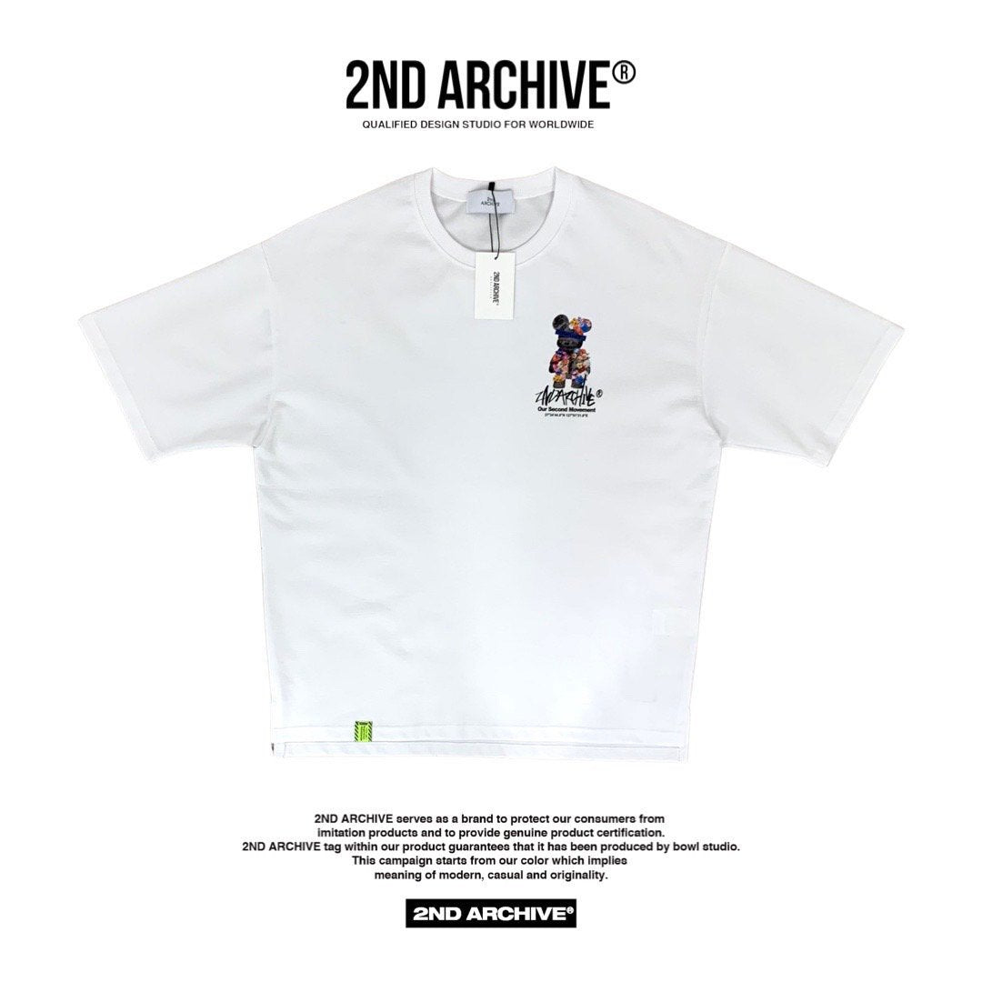 Front facing white t-shirt from Korean street fashion brand 2nd Archive with small teddy bear graphic on chest. 