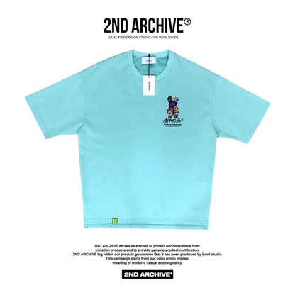 Light blue front facing street fashion t-shirt with cute bear logo. 