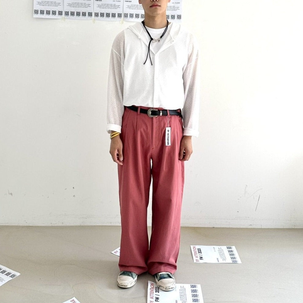 Salmon-colored Korean street slacks, oversized cut.