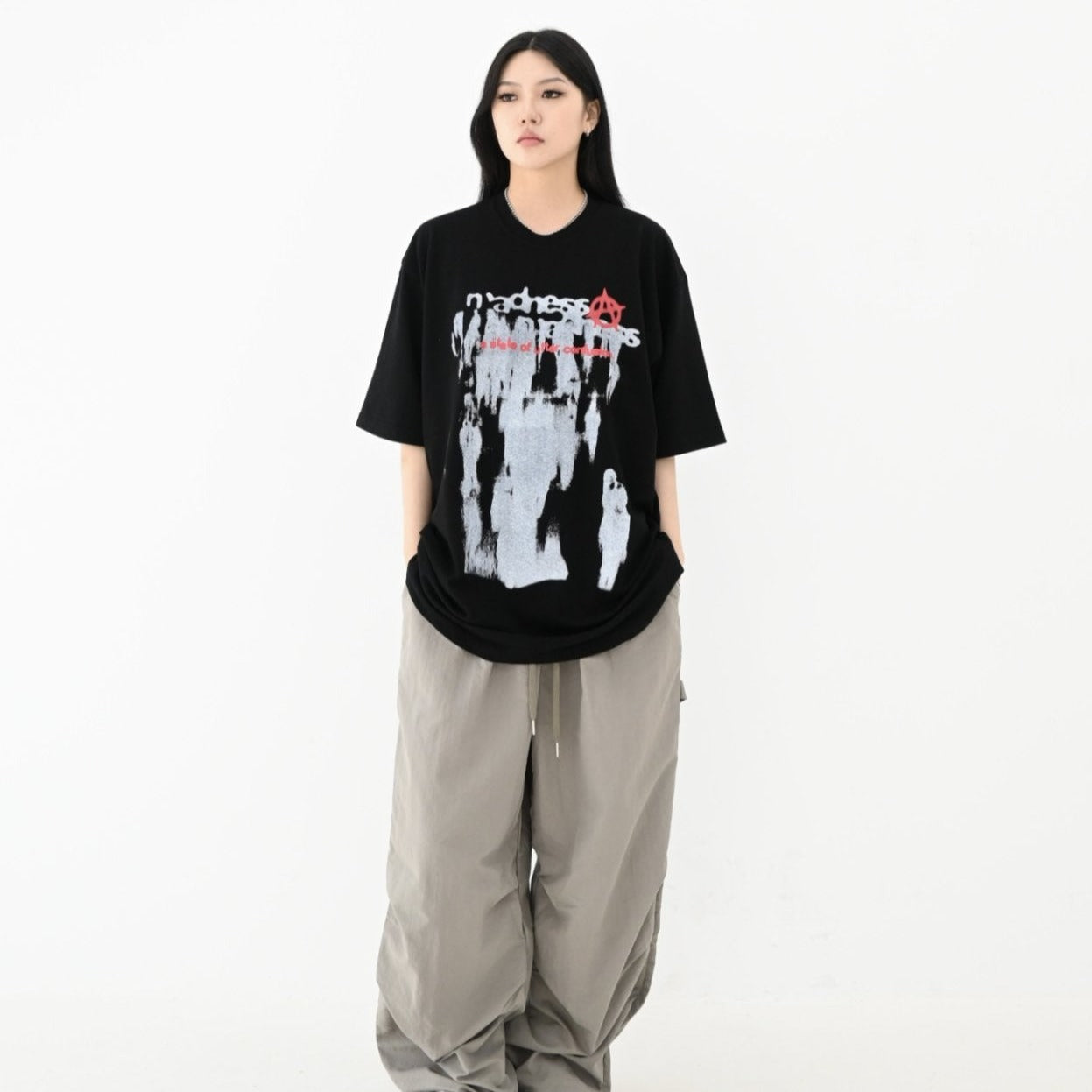 Trendy Korean tee featuring gothic graphic and text.