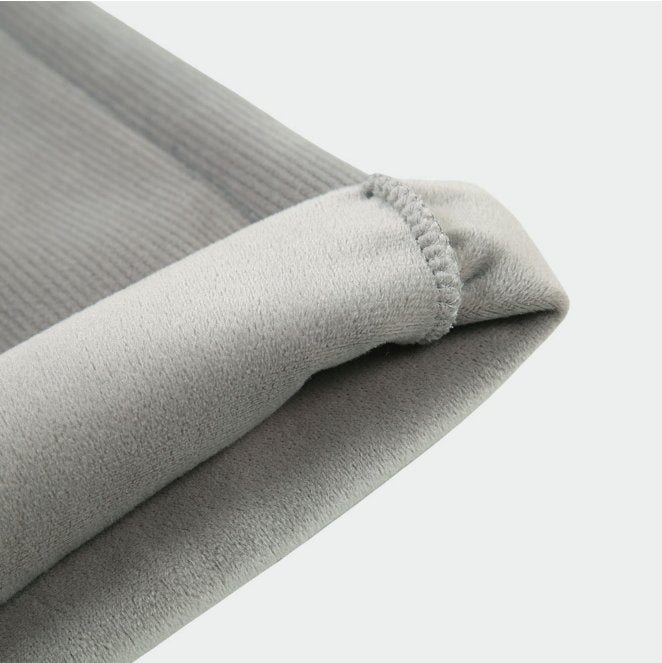 Up close view or microfiber inner layer of warm corduroy pants. 