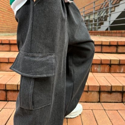 Black cargo pants, oversized fit, Korean street fashion.