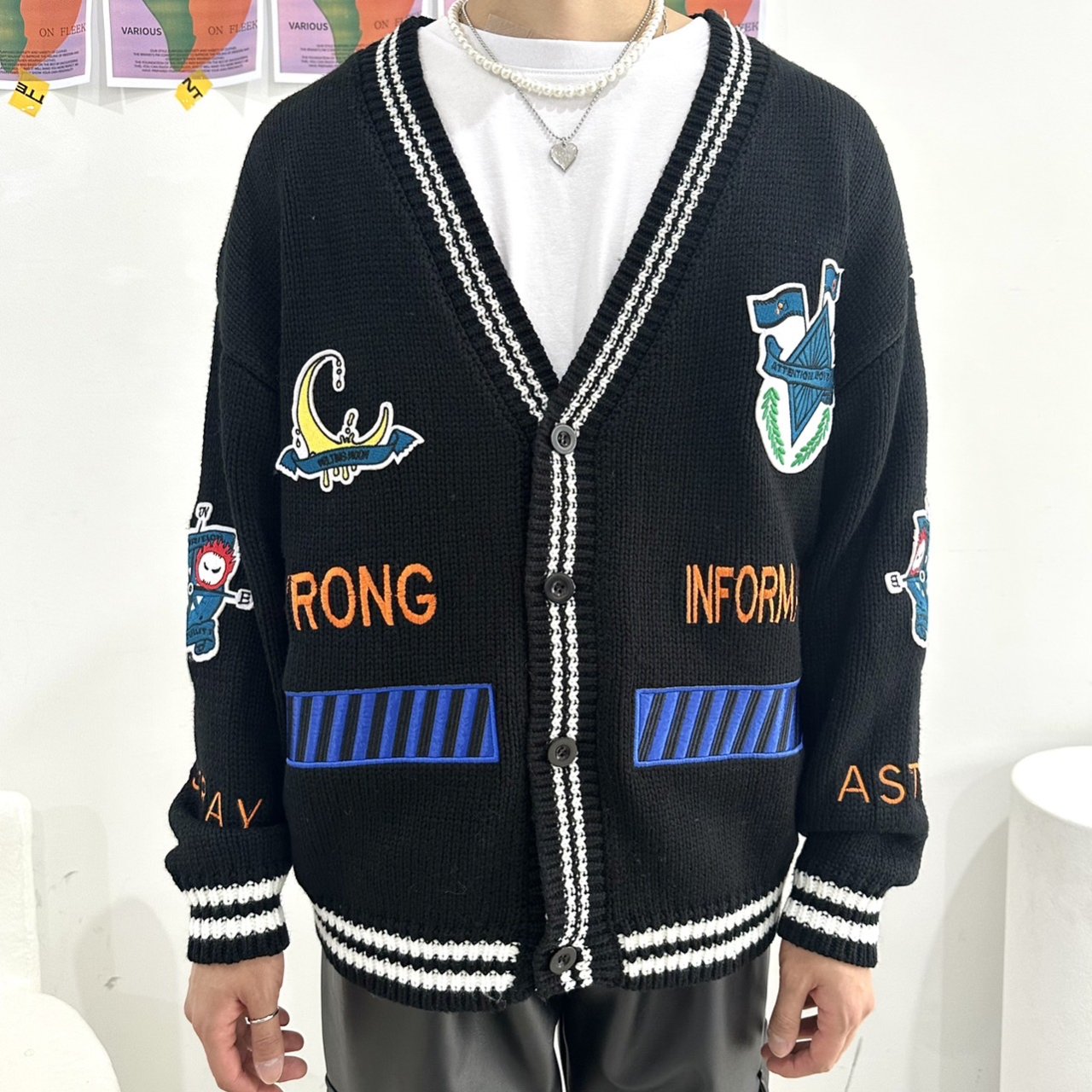 Black cardigan with Korean street-style patches.