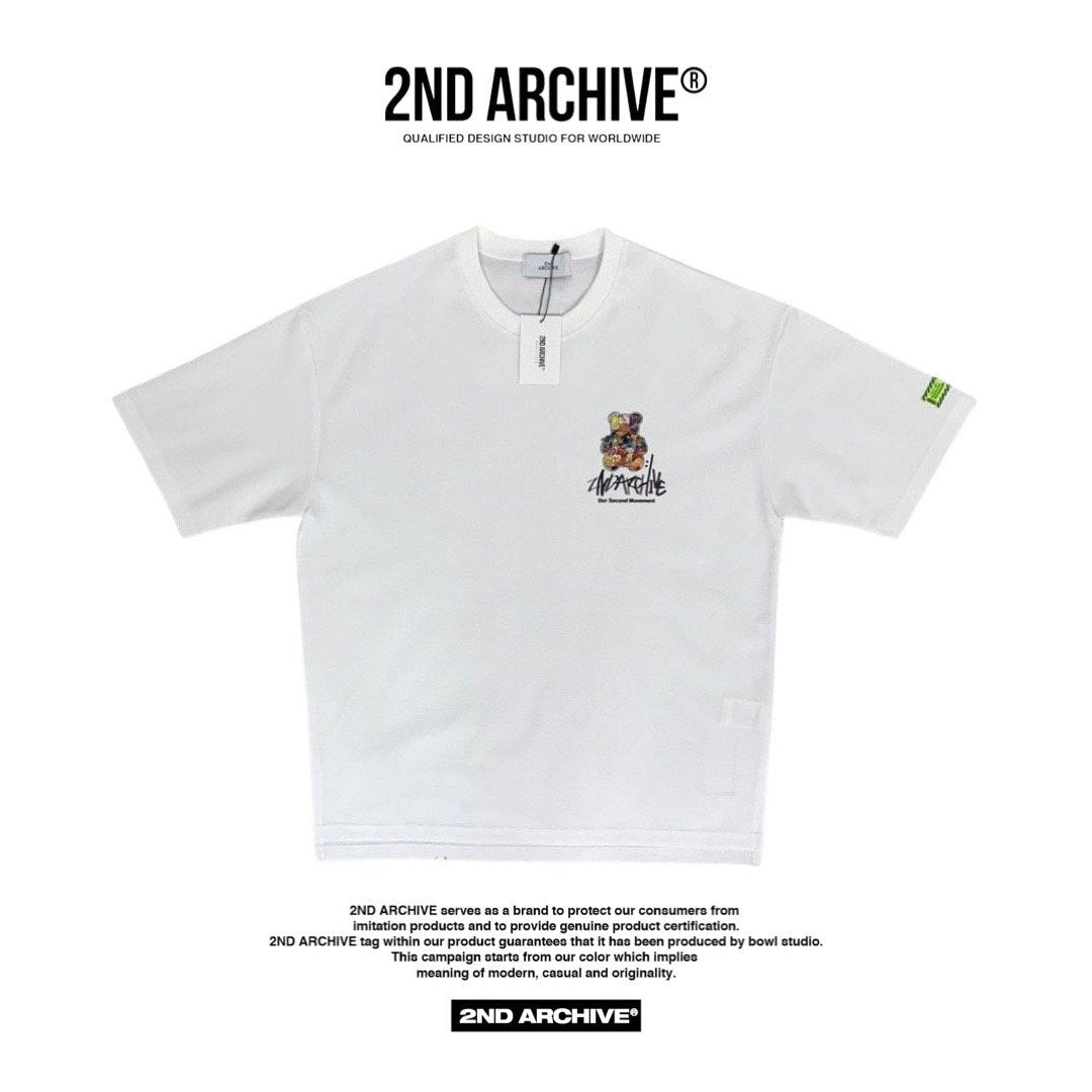 Front facing white t shirt with small bear graphic on the chest and 2nd Archive logo. 