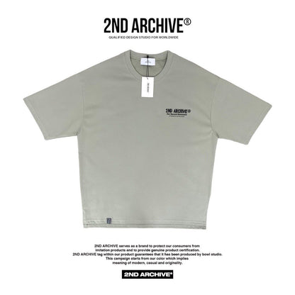 Front facing khaki street fashion t-shirt with small logo on chest. 