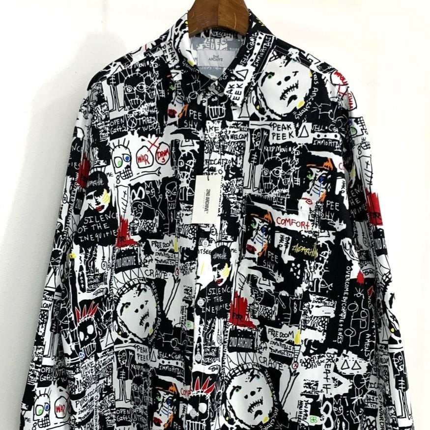 Hanging pop art graphic shirt.