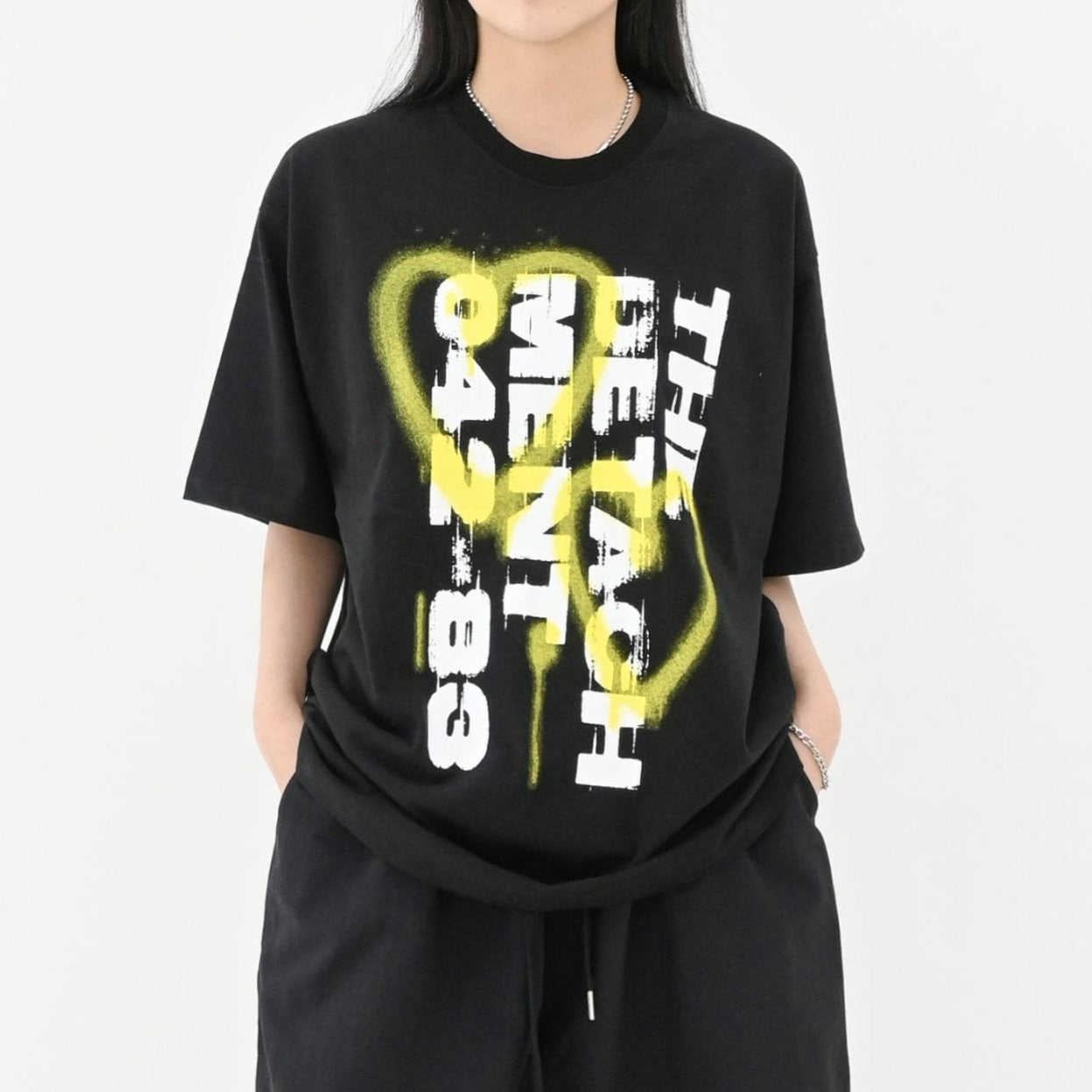 Edgy Korean T-shirt with eye-catching English writing.\