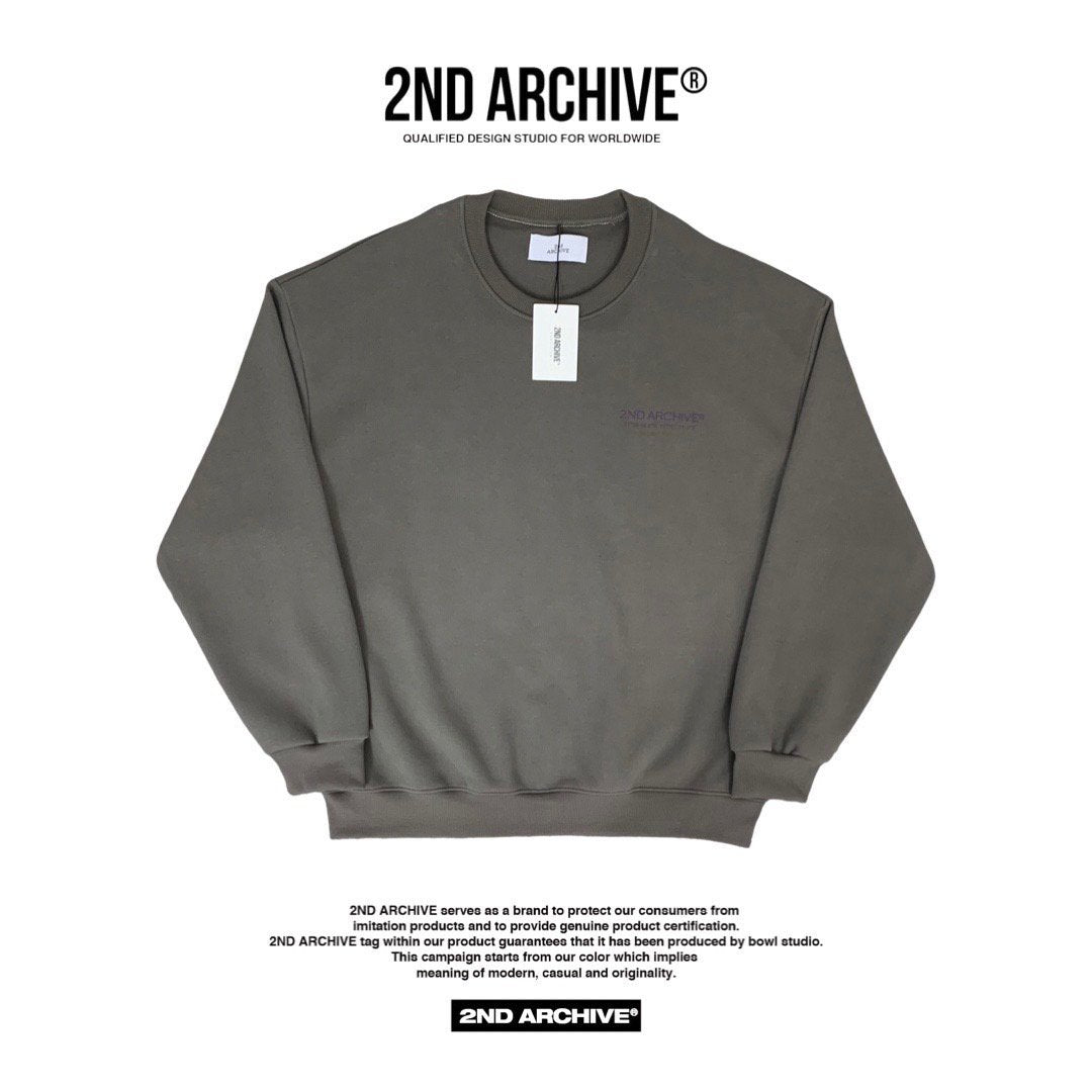 Stylish long sleeve sweater featuring embroidered 2nd Archive logo