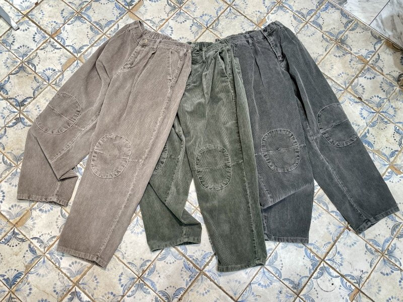 Retro corduroy pants with stylish knee patches.