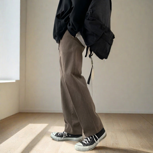 Side view of Korean made pants being worn by a model. 