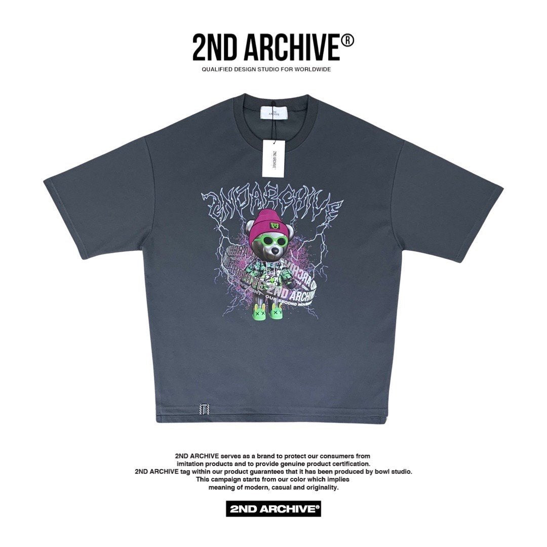 Dark gray front facing graphic t shirt with hip hop style teddy bear graphic made in Korea. 