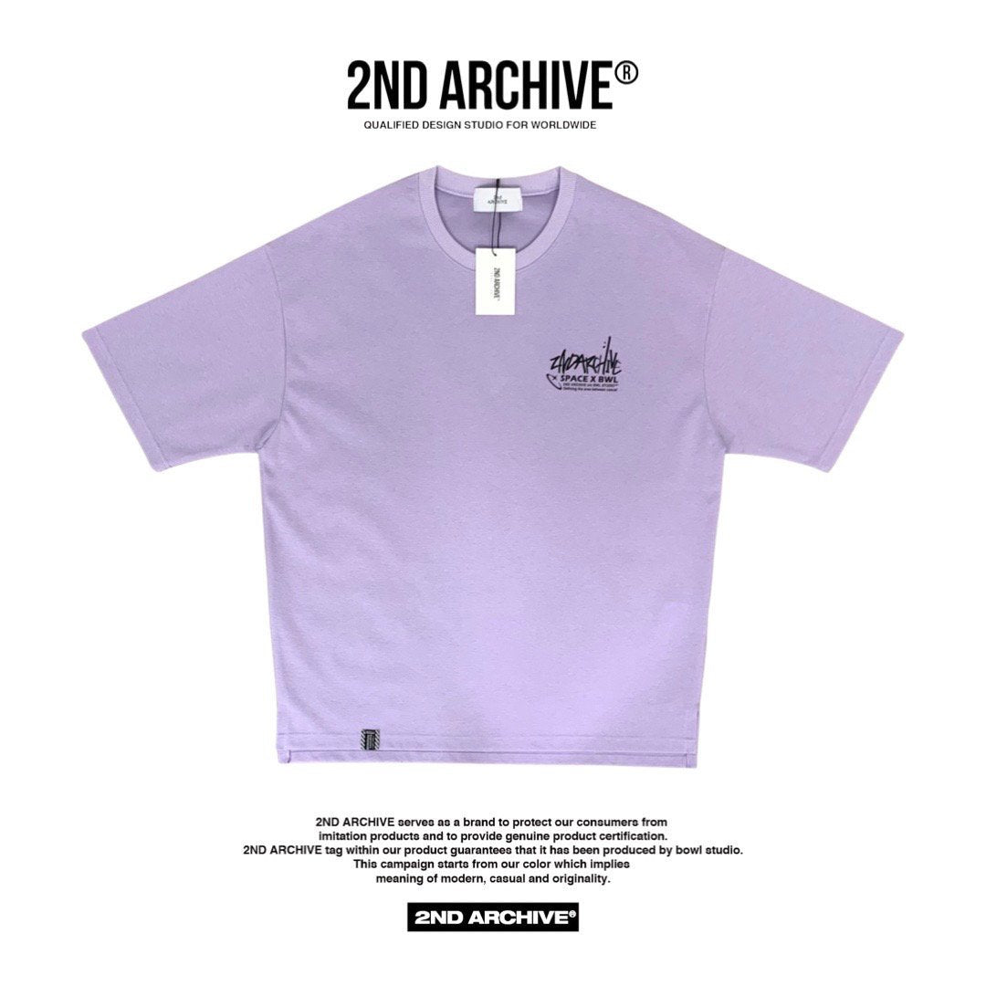 Front facing light purple t shirt with 2nd Archive logo on the chest. 