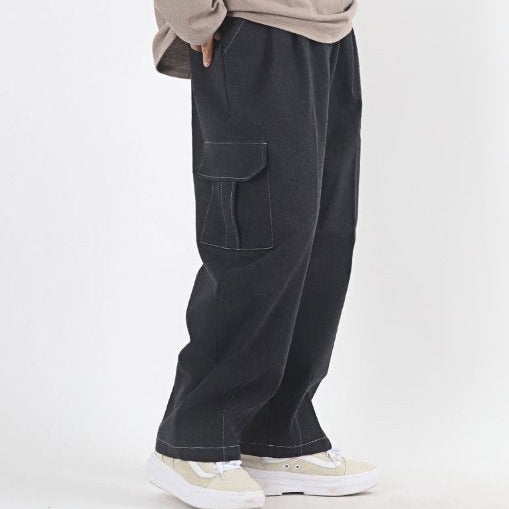 Oversized black denim cargo pants, made in Korea.