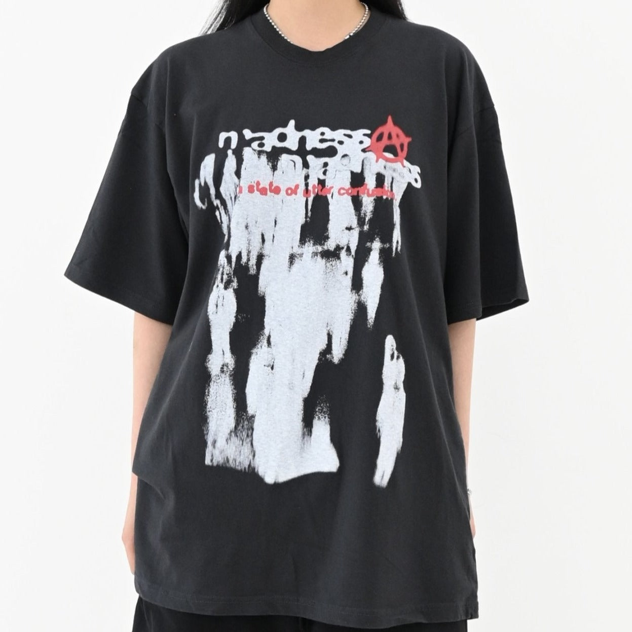 Cool Korean fashion T-shirt with edgy gothic graphic.