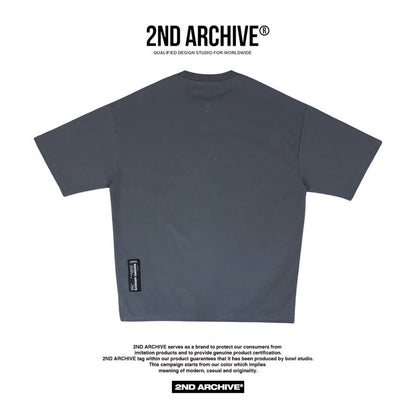 Back facing dark gray t-shirt from 2nd Archive brand. 