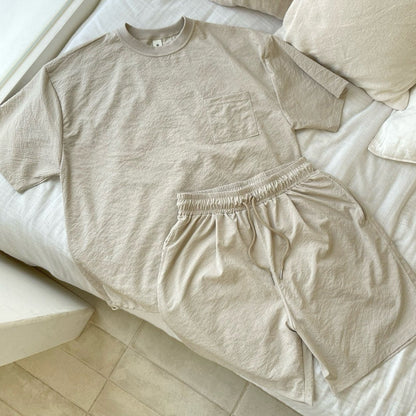 One size fits all beige shorts and t shirt set. 