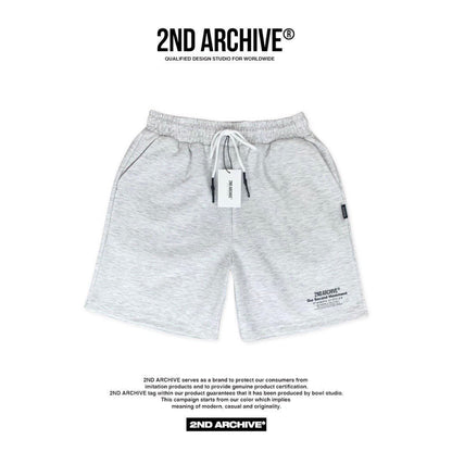 Light gray shorts with adjustable waist. 