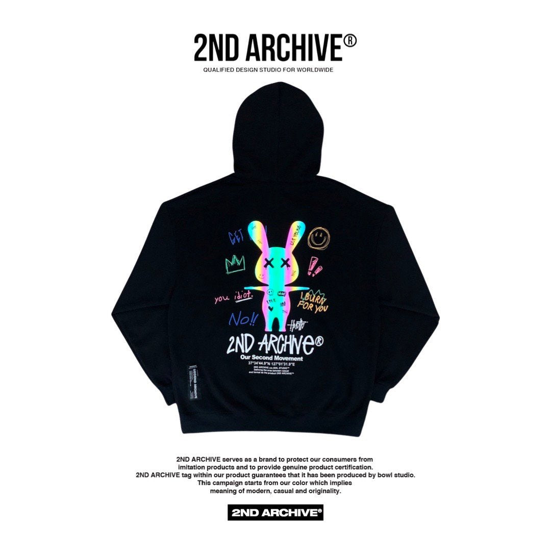 Back facing hoodie sweater with a reflective bunny graphic from Korean street fashion brand. 