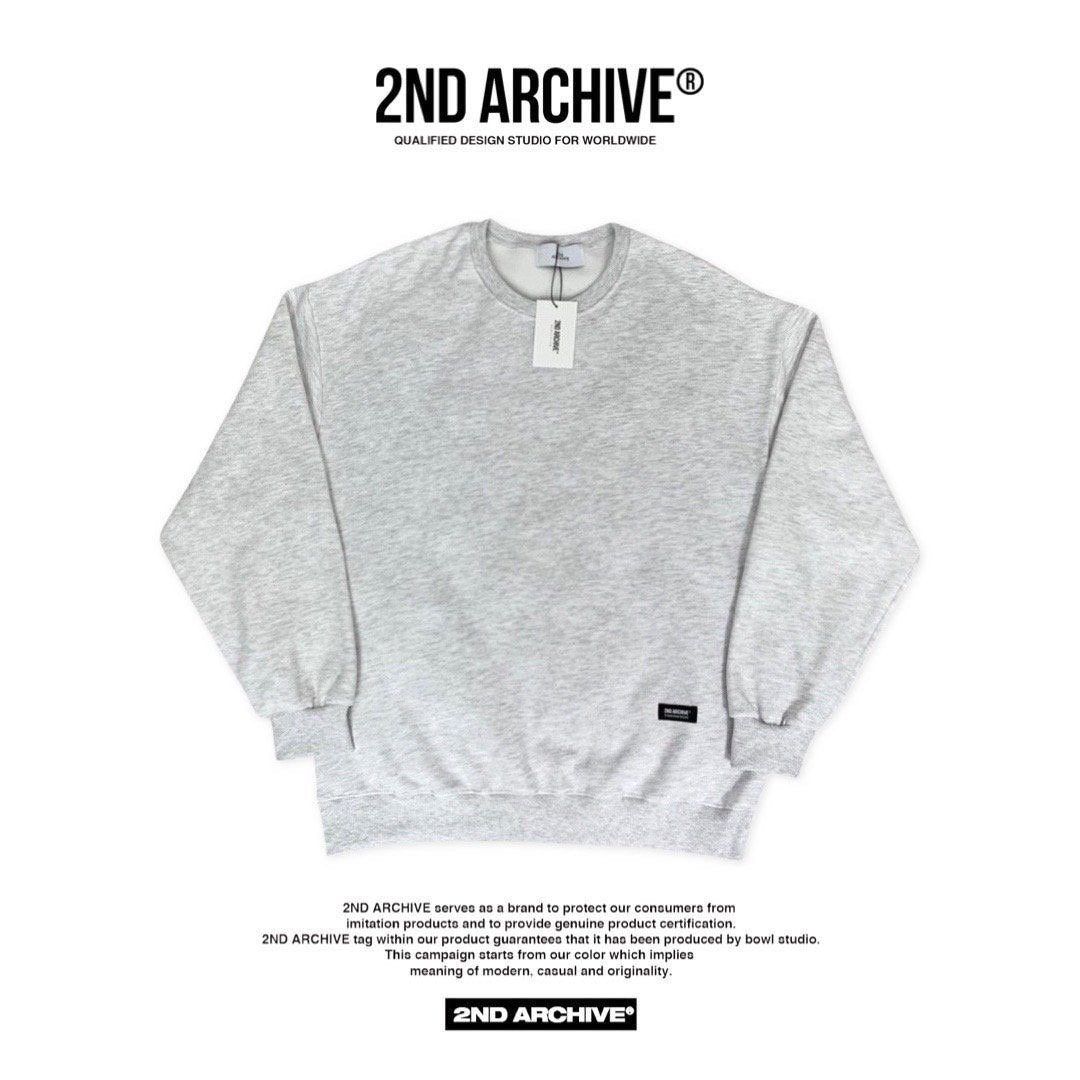 Front facing light gray sweater with small logo for winter. 