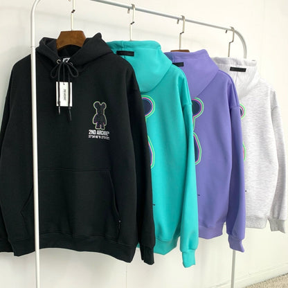 Best selling hoodie sweaters hanging on rack from 2nd Archive brand. 