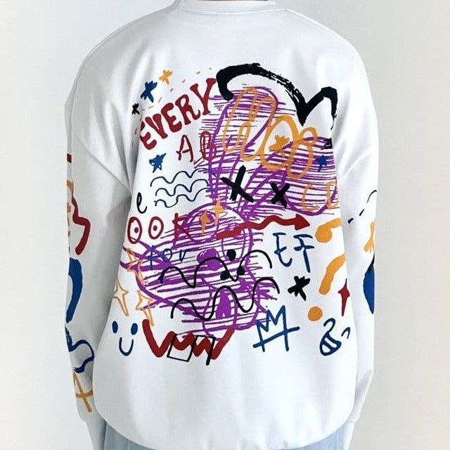 White sweater with graffiti print