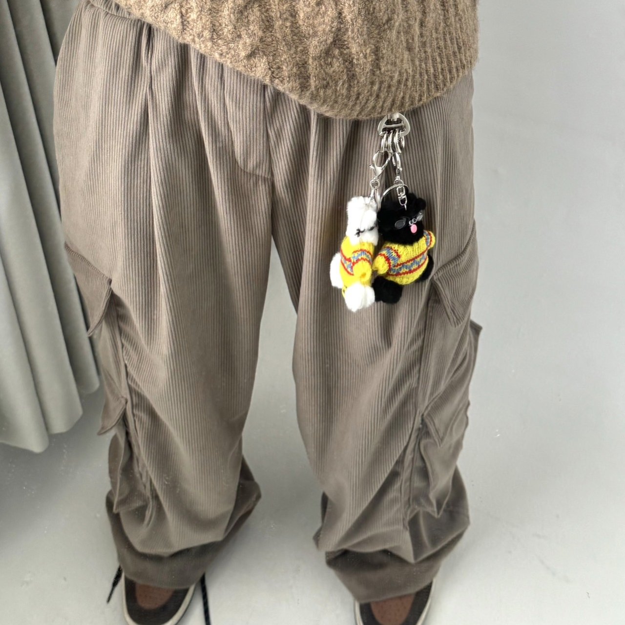 Stand tall in these Korean street fashion cargo pants, boasting an oversized silhouette and a bold black, gray, and brown color scheme.